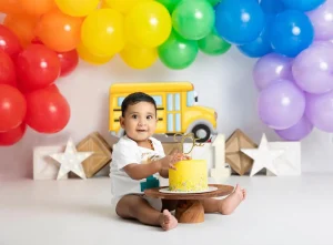 Playing with a baby's cake in a cake smash is an attractive subject